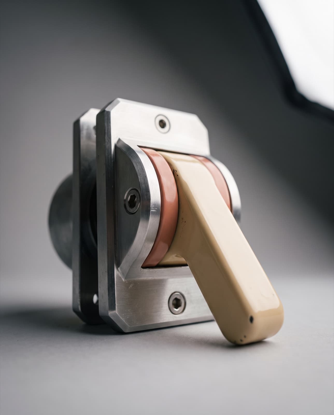 Circuit-breaker lever, cream enamel with clay accent